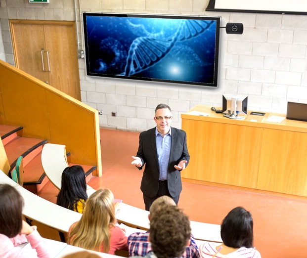 professor in a lecture hall with students using ScreenBeam tech