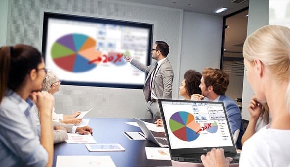 man presenting in a conference room